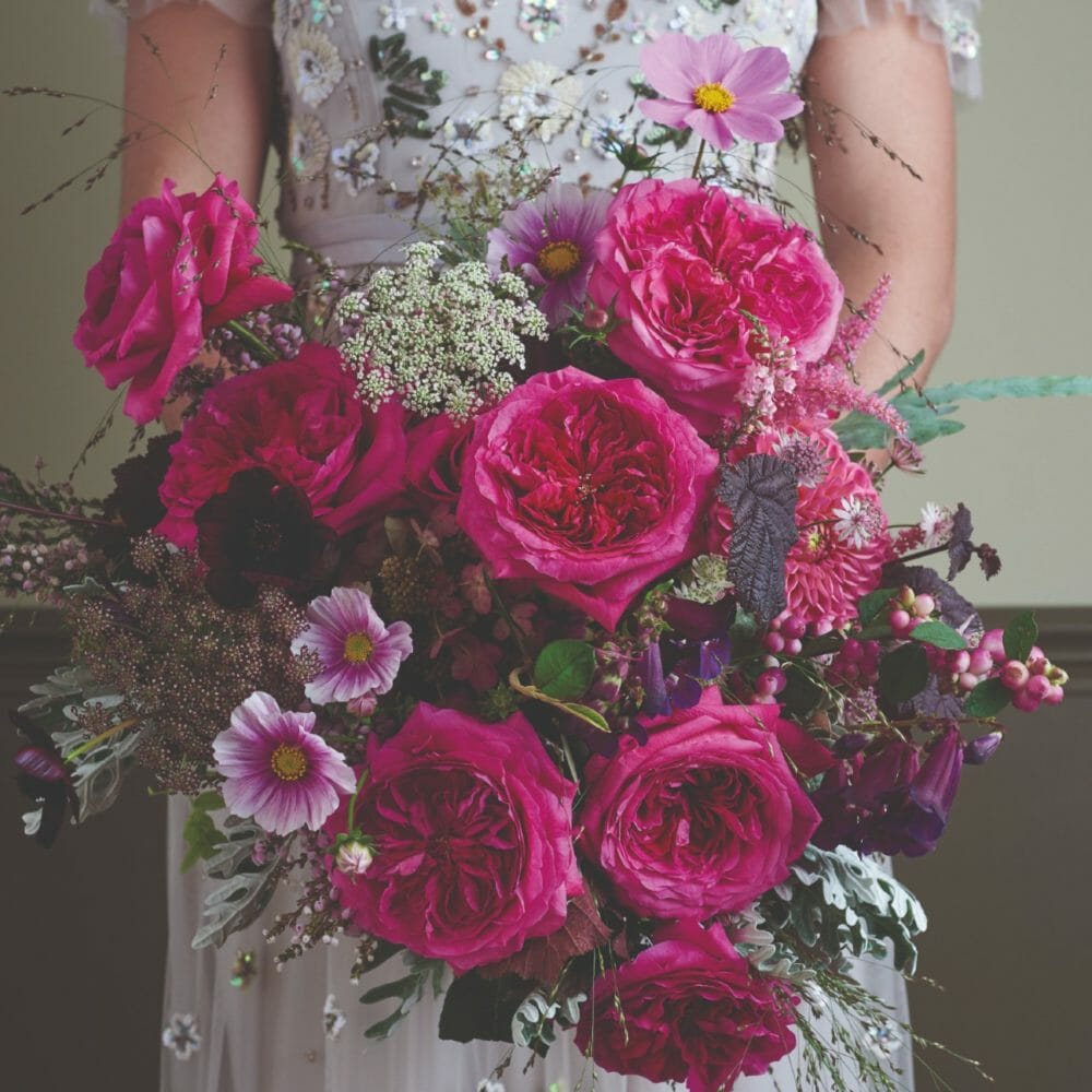 David Austin Capability garden roses in a rich berry-toned bouquet