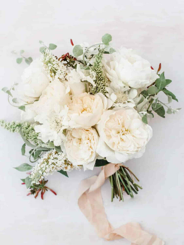 A white loose bridal bouquet with Purity garden roses