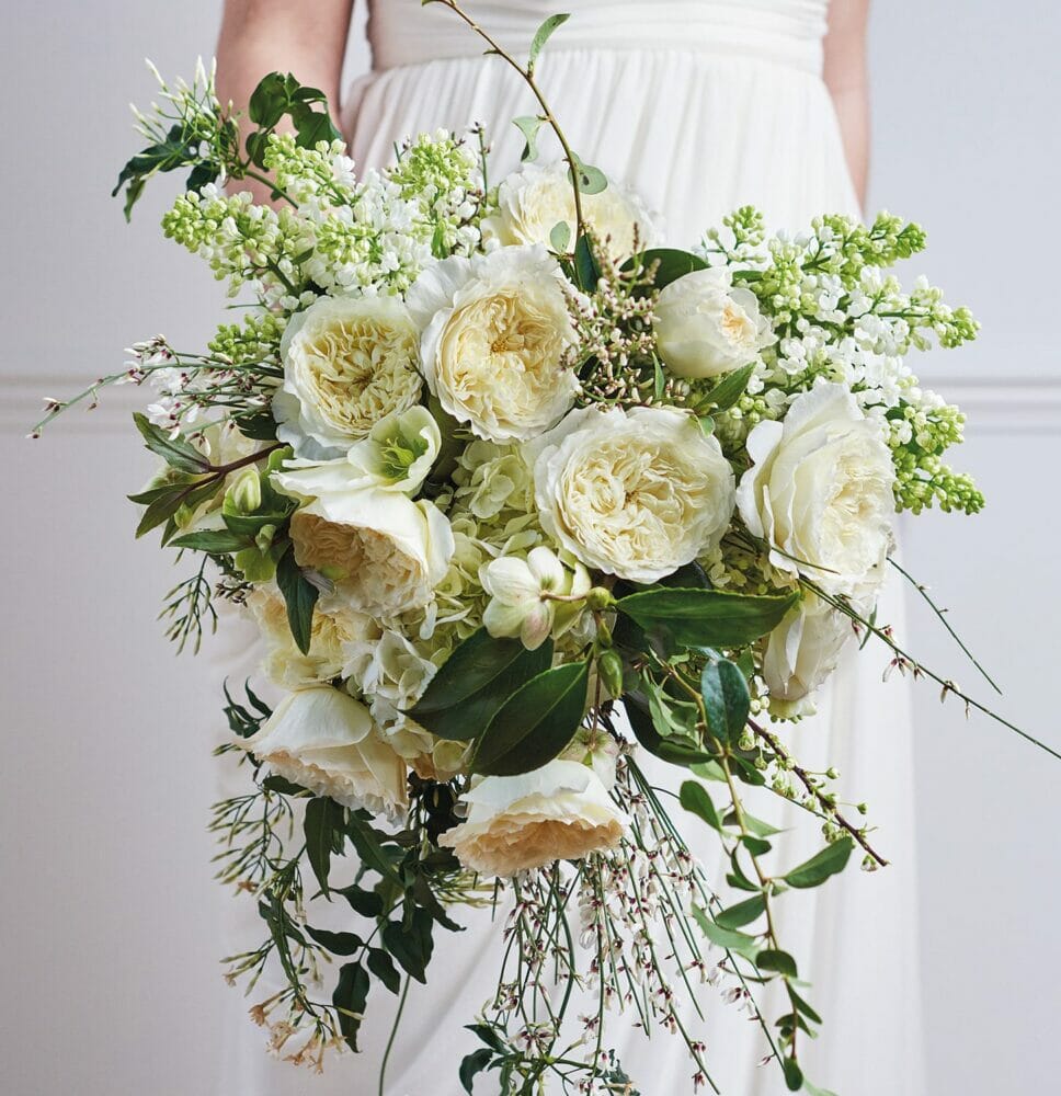 Textured green and white bridal bouquet with patience garden roses